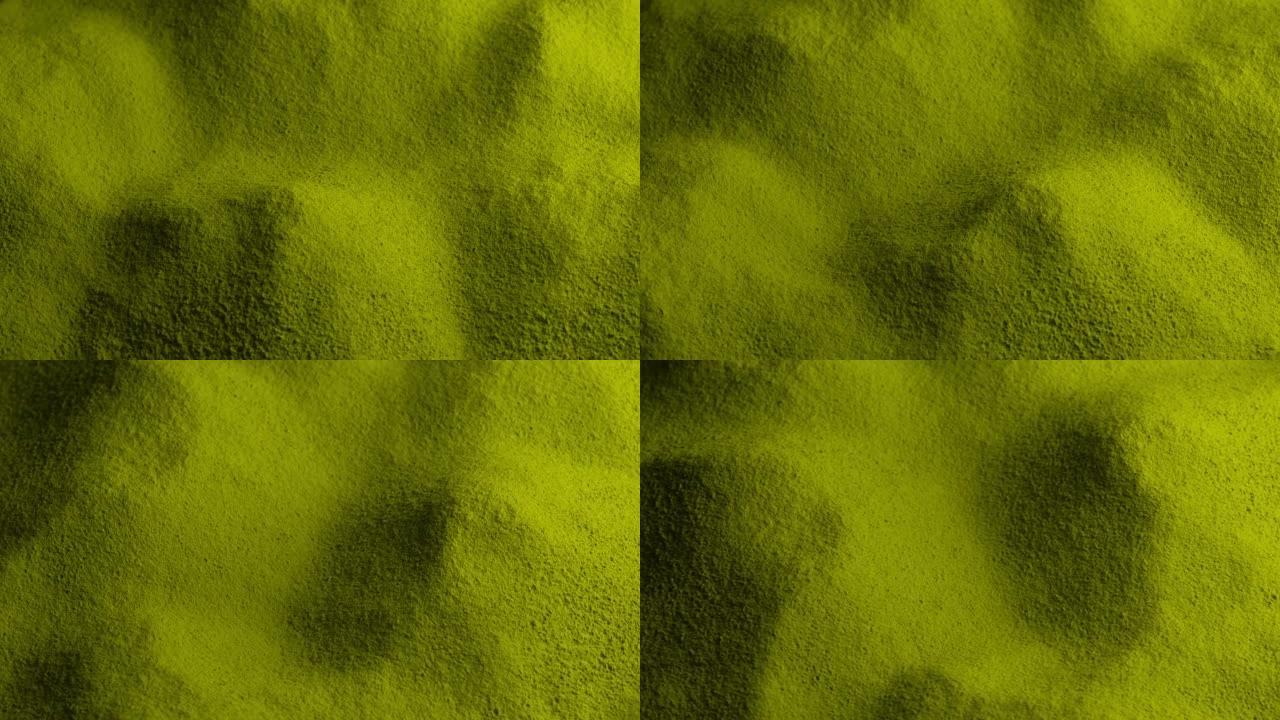 粉状黄绿色材料缓慢旋转
