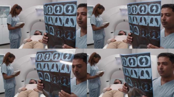 放射科医生在ct扫描室阅读肺部x射线
