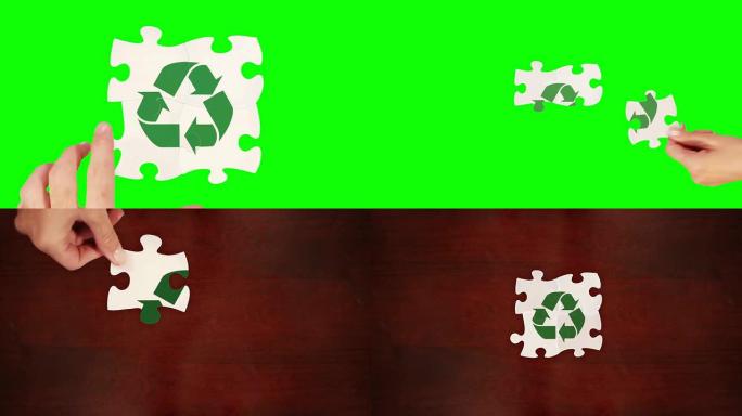 双手解决难题。绿屏和木头。回收符号。