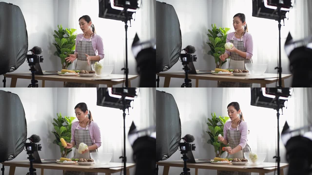 女厨师在家里在线举行的虚拟烹饪课活动中与观众交谈