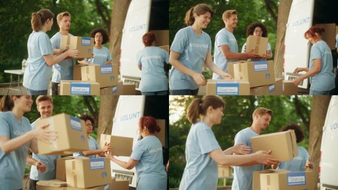 由年轻志愿者组成的快乐团队准备人道主义援助和捐款，在户外的货车中装载纸板箱。慈善工作者在人道主义捐赠