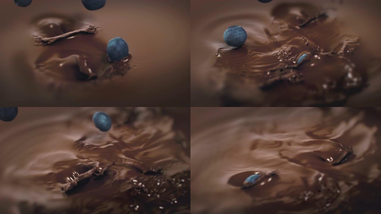 蓝莓以4k超慢动作溅入液体黑巧克力中