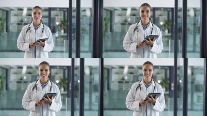一名年轻医生在现代医院使用数字平板电脑的4k视频片段