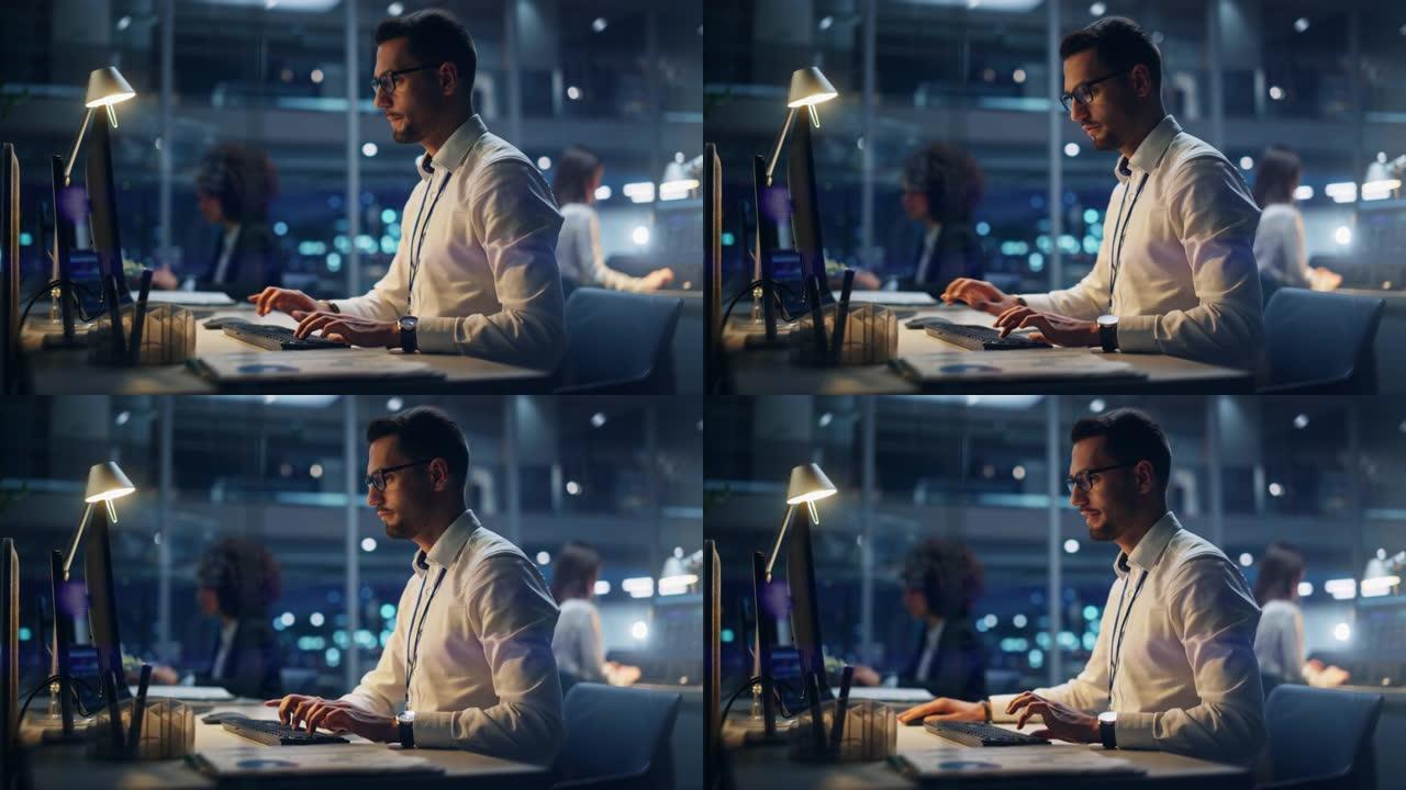 晚上在大公司办公室: 穿着白衬衫的自信经理的肖像，使用计算机，商人和专家在他周围工作，分析统计数据，
