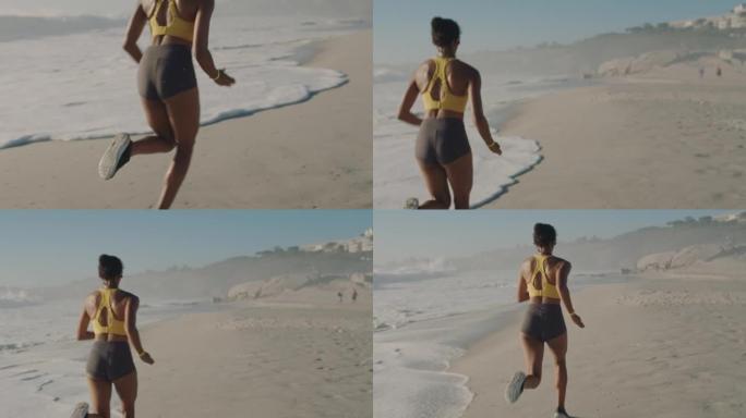 活跃，健康且运动的女人在海滩上的海边跑步，冲刺或慢跑。一种专注，认真和坚定的黑人女性训练，在夏季进行