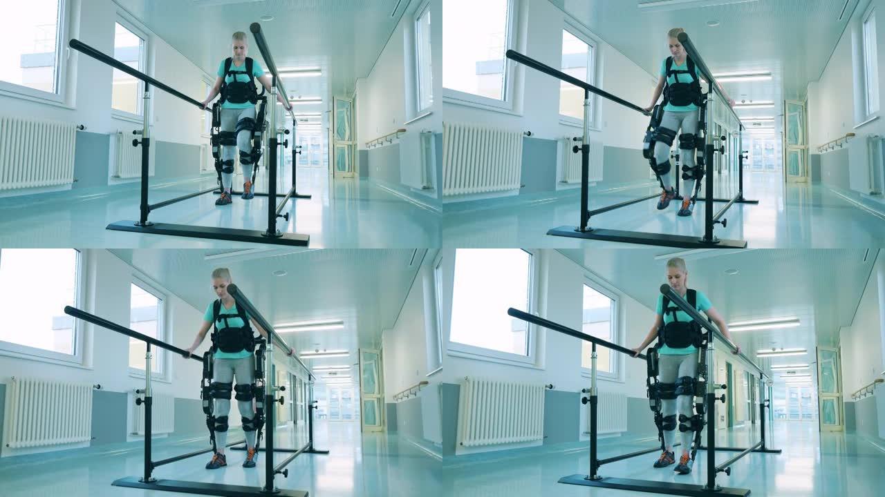 残疾的年轻女子正在学习外骨骼行走