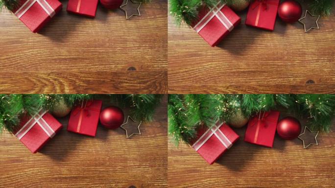 木制背景上带有礼物和复制空间的圣诞节装饰视频