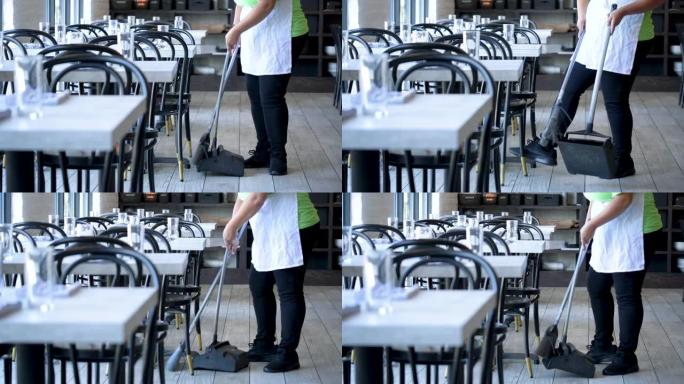 餐厅工作人员扫地