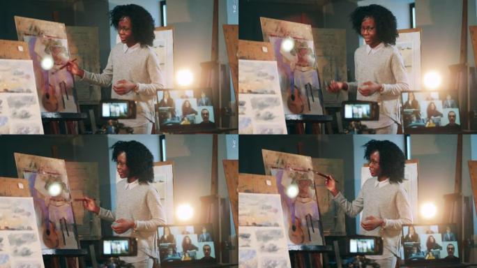 非洲族裔女士正在教一群在线学生如何绘画