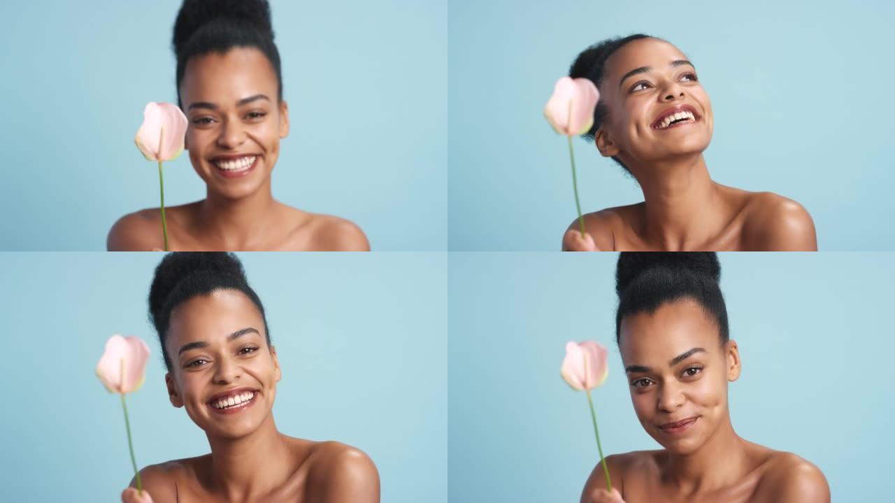 黑人妇女，和平百合花和蓝色工作室背景下的护肤，在放松健康，健康和面部护理。微笑和快乐模特在自我护理中