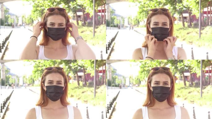 年轻的成年妇女戴着污染面具，以保护自己免受病毒侵害。