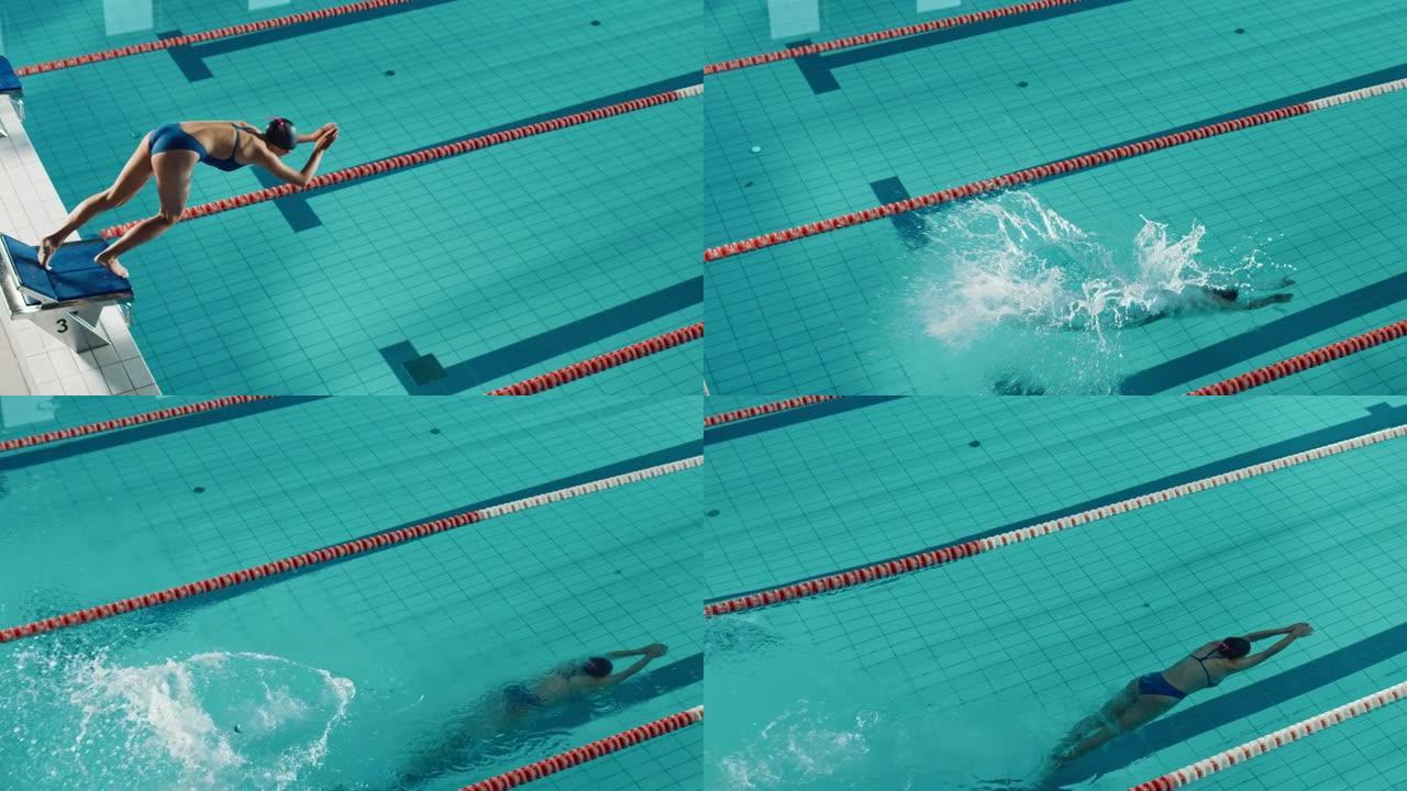 美丽的女游泳运动员在游泳池潜水。决心赢得冠军的职业运动员，前爬行，自由泳。具有时尚色彩，艺术高角度的