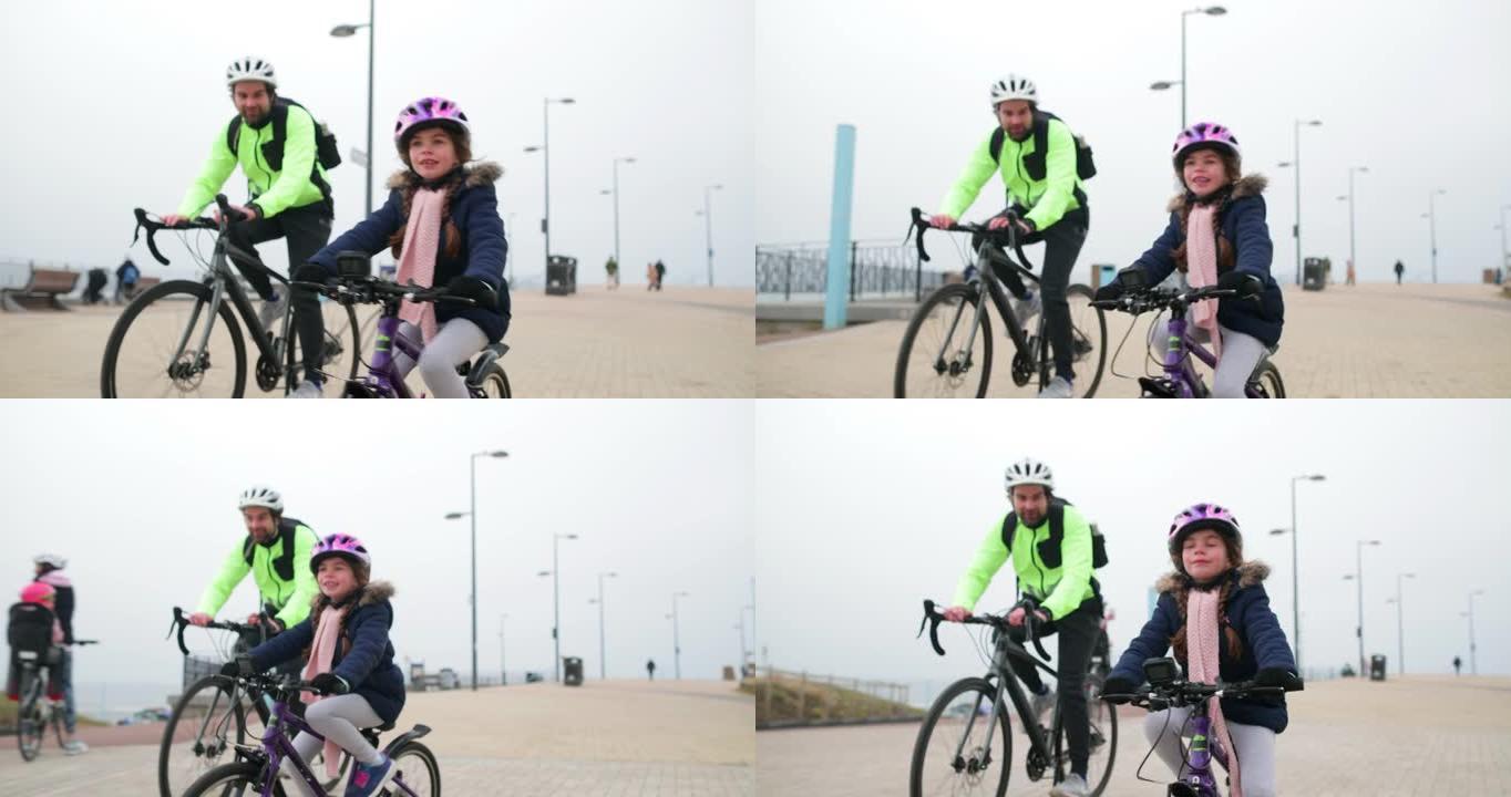 父女骑自行车带着孩子骑行保驾护航