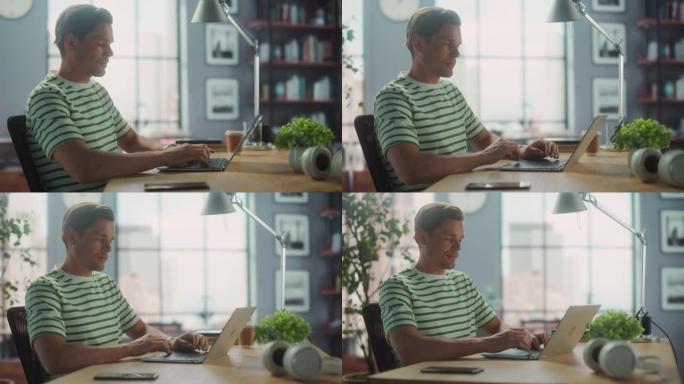 英俊的白人男子坐在办公桌前在笔记本电脑上进行远程在线工作的肖像。自由职业者在家工作。弧形中弹