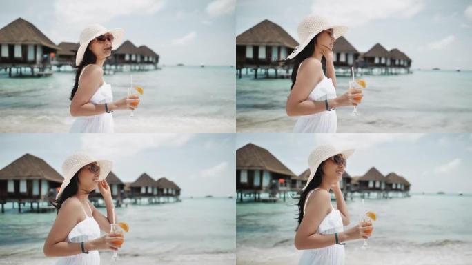 亚洲旅游妇女喝橙汁，健康饮料