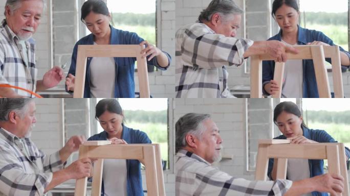 工人木工高级男子年龄70岁和十几岁的女孩一起在工厂里制作木制家具。工厂和制造概念。