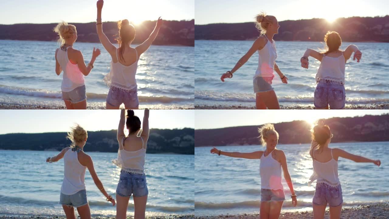 在法国的海滩上，两个朋友嬉戏地挥舞着手臂的4k视频片段
