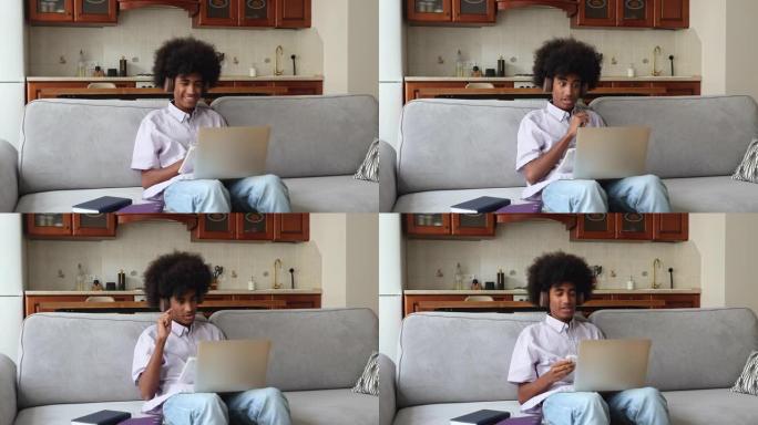 非洲青少年在网上学习使用笔记本电脑和可视电话应用程序