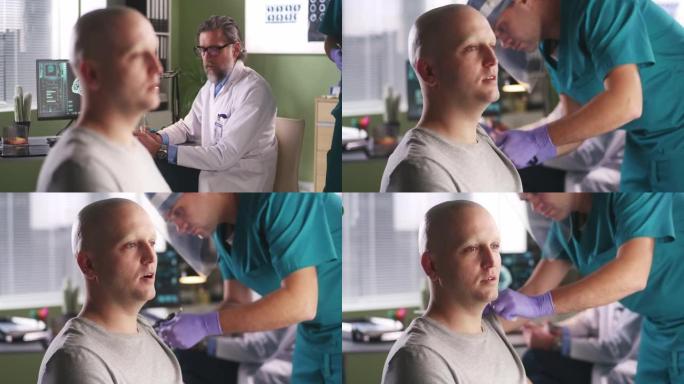 秃头男子在接种疫苗时与肿瘤学家交谈