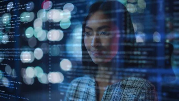 亚洲女性创业数字企业家在计算机上工作的肖像，代码线投射在他的脸上并反射。使用人工智能、大数据开发创新