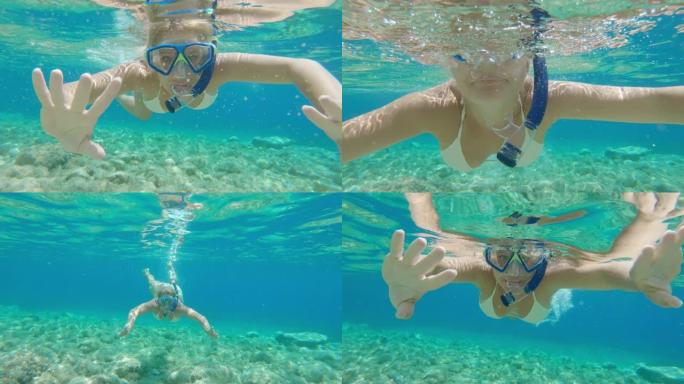 女士到CU肖像年轻女子在克罗地亚阳光明媚的亚得里亚海水下浮潜