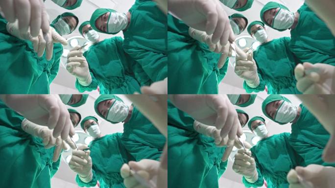 4K UHD观点: 一组外科医生在医院手术室为冠状病毒新型冠状病毒肺炎患者做胸部手术。医院医疗保健概