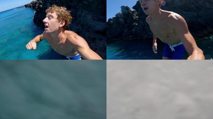 POV慢动作极端年轻人在悬崖跳进热带蓝色海洋时做后空翻