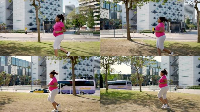 敬业的年轻孕妇在公园慢跑