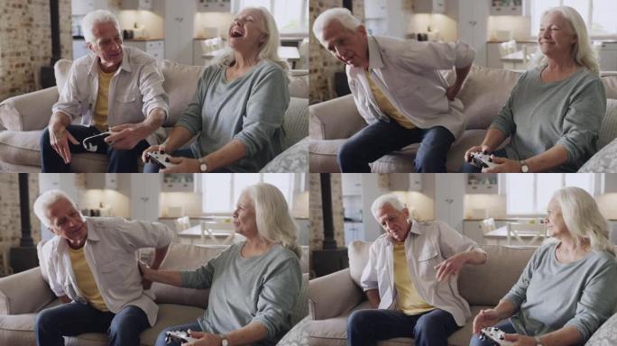 4k视频片段，一名高级男子与妻子玩电子游戏后背部疼痛
