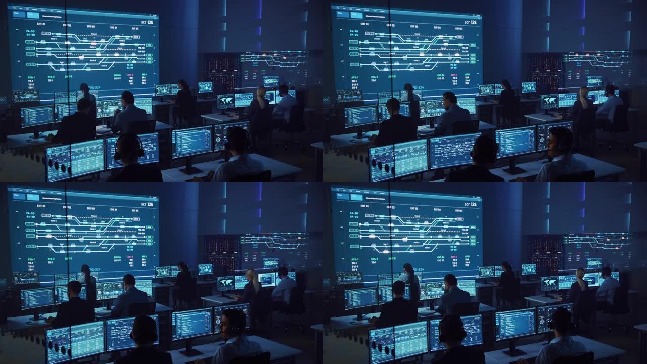 专业的计算机数据科学工程师团队在台式机上工作，屏幕上显示图表，图形，信息图表，技术神经数据和统计数据