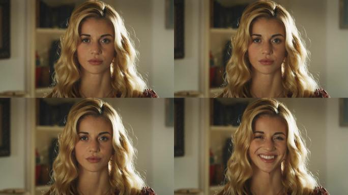年轻迷人的幸福女人的电影镜头，金色长发，眉毛刺穿，在家里的客厅里微笑着。