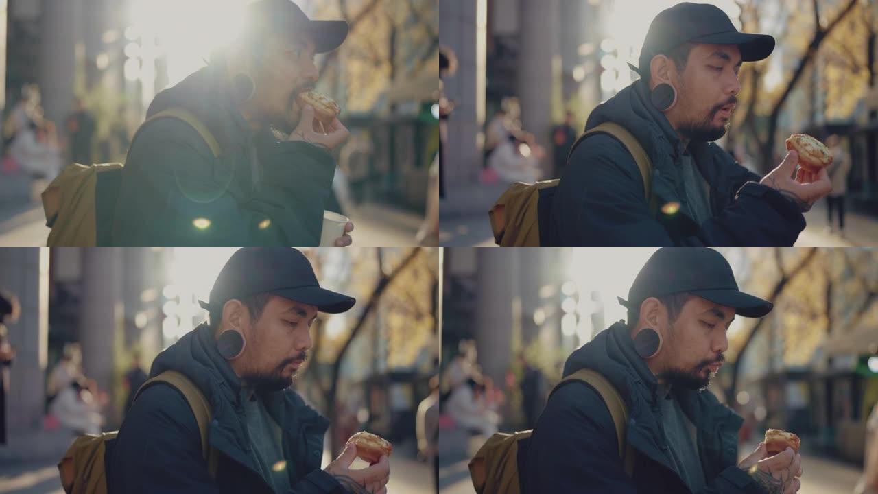 一个年轻英俊的男人喜欢吃韩国当地街头小吃的肖像。