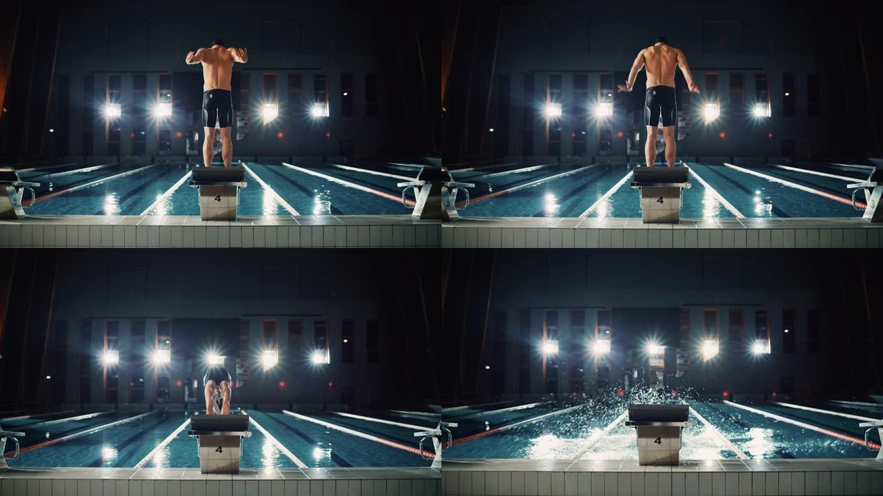 肌肉发达的男性游泳者来到起跑器跳进游泳池。职业男子运动员准备赢得冠军。电影光，慢动作，耀斑光，后视图