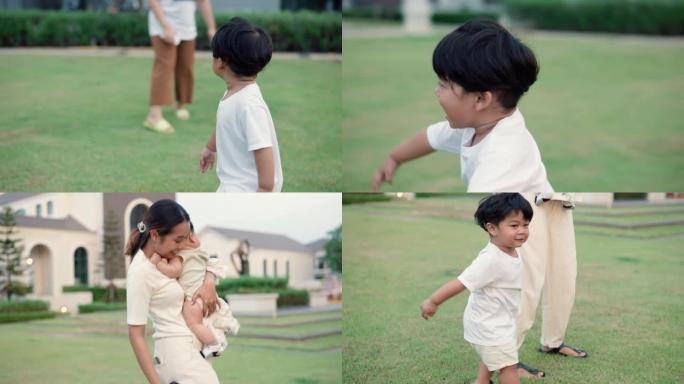 幸福一家人晚上在公园散步