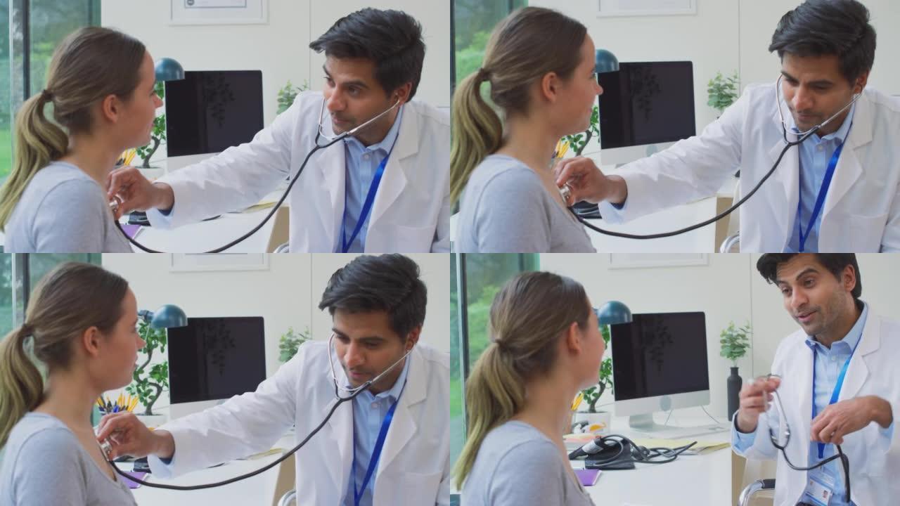 男医生或全科医生穿着白大褂检查十几岁的女孩用听诊器听心跳-慢动作拍摄