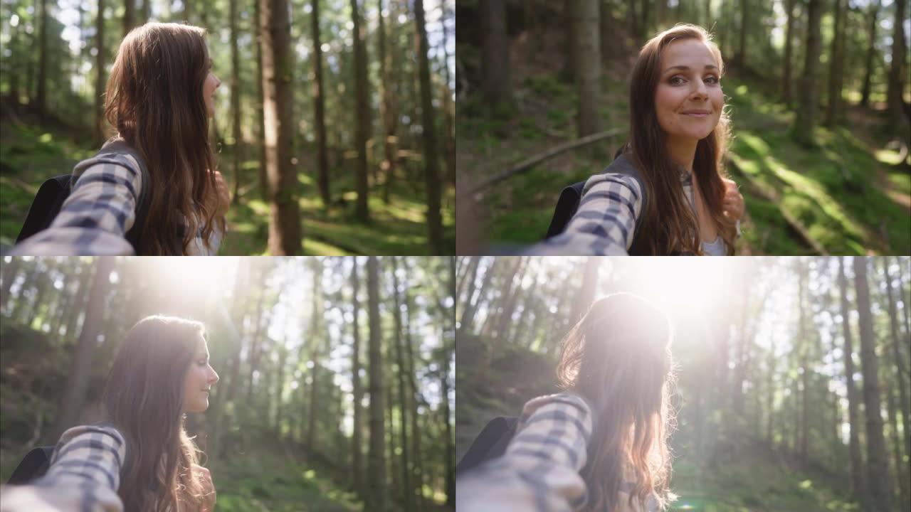 女人在森林中拍摄自己的徒步旅行-视频自拍照