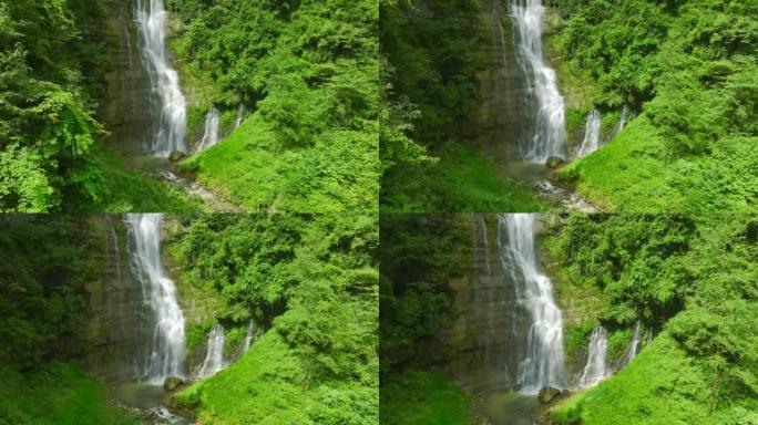 山上美丽的水满大瀑布森林植被自然风景