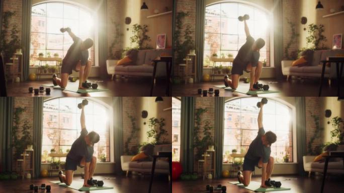 适合运动强壮的年轻人训练和加强手臂肌肉在晨练期间在阳光明媚的公寓。健康生活方式和健身理念。