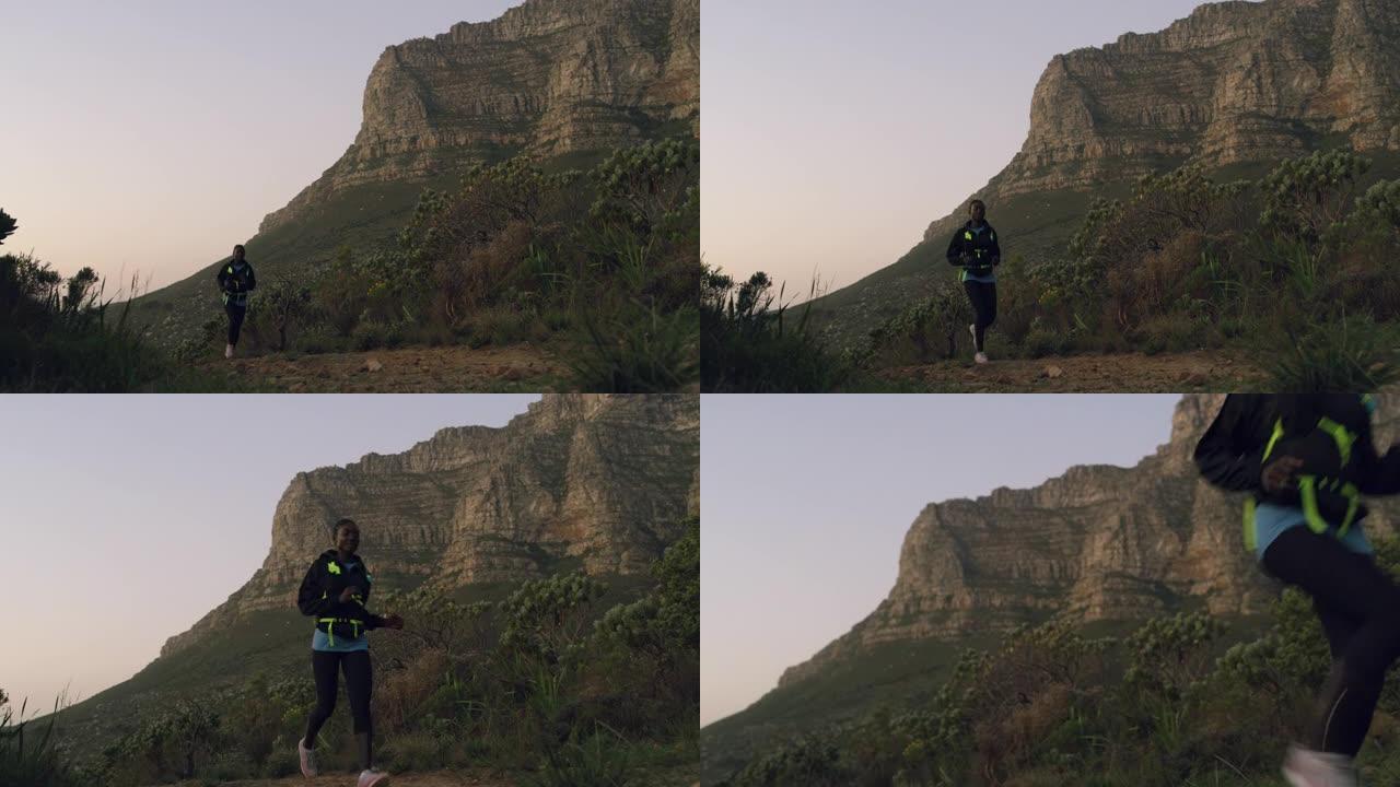 4k视频片段，一名年轻女子在山路上奔跑