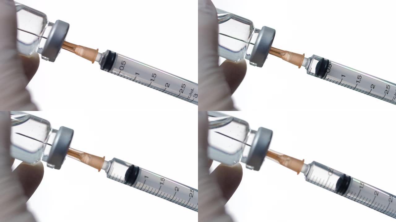 医疗手和注射器正在实验室接种疫苗