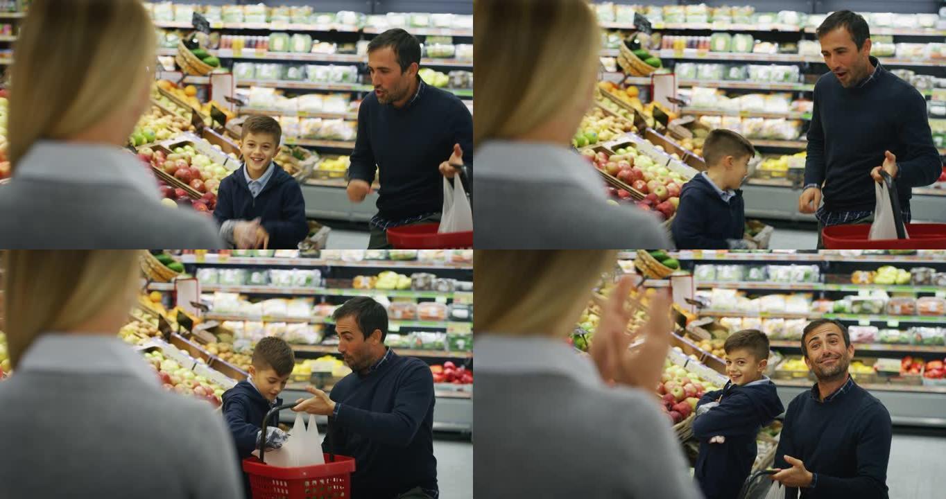 父亲，母亲和儿子的幸福家庭的真实照片在超市一起购物时，选择产品很有趣。
