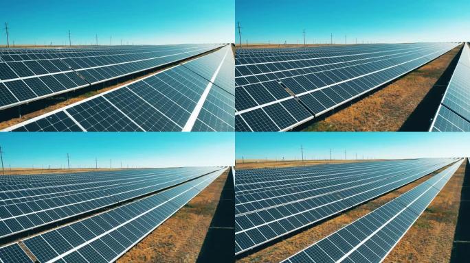 节能、能效、可再生能源概念。由太阳能电池板组成的一排排电气装置