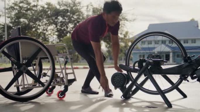 亚洲男子残疾运动员为训练准备手自行车。