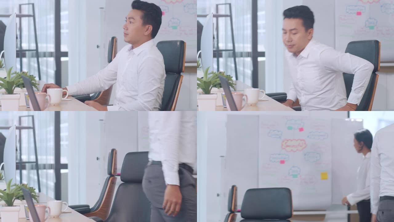 亚洲年轻商人智能休闲装使用台式电脑思考灵感搜索问题解决思路丢失在现代办公室工作过程中。