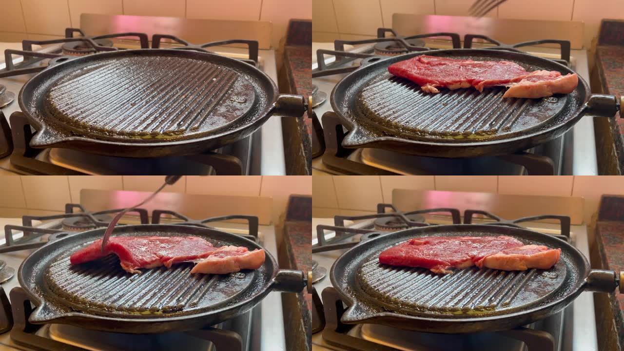 排骨在铸铁锅里，女人用叉子推进肉。特写。4k分辨率。