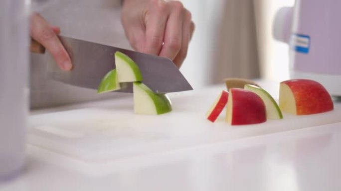 手工切割青苹果: 健康的生活方式理念