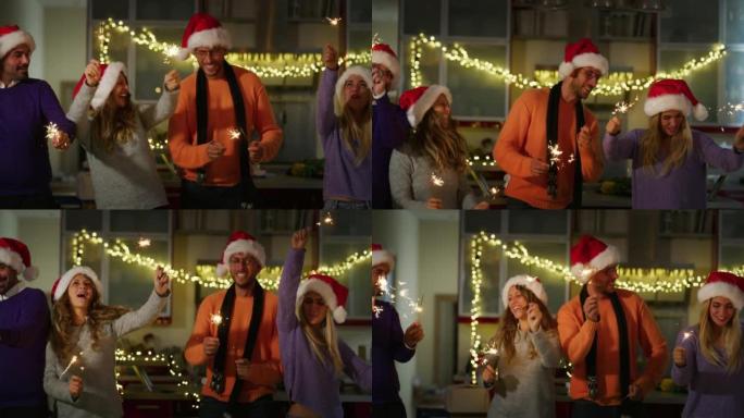 真实的照片是戴着圣诞老人帽子的快乐快乐的朋友，他们在庆祝时手里拿着烟火唱着圣诞歌曲。家庭、友谊、寒假