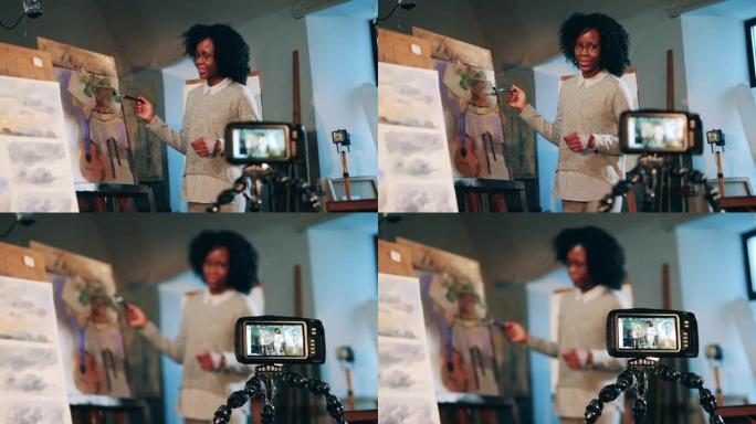 一位非洲女士的艺术课正在相机上拍摄