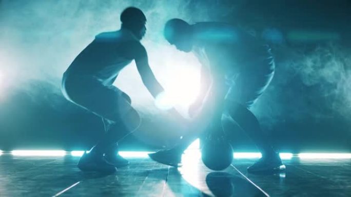 非洲运动员在黑暗中争夺篮球