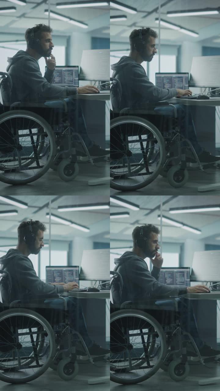 垂直屏幕。残疾友好办公室: 残疾的IT程序员在台式计算机上工作的轮椅。男性专家创建励志软件。工程师开